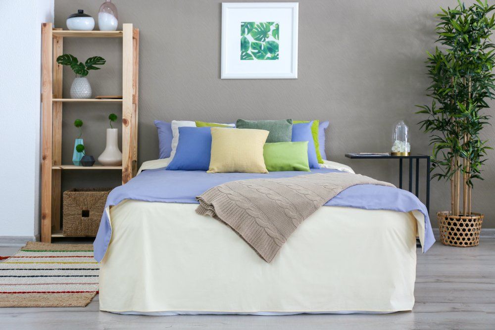 Bed With Lots Of Throw Pillows — Furnishers in Alice Springs, NT