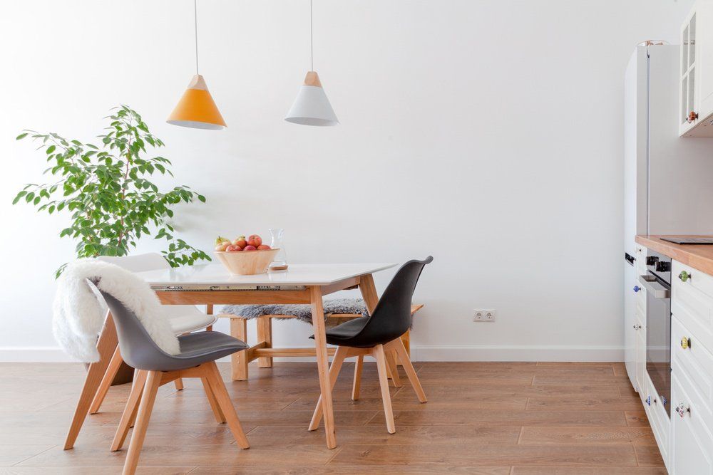 Dining Table With Black Chairs — Furnishers in Alice Springs, NT