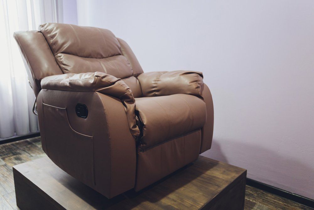 Brown Leather Reclining Chair — Furnishers in Alice Springs, NT