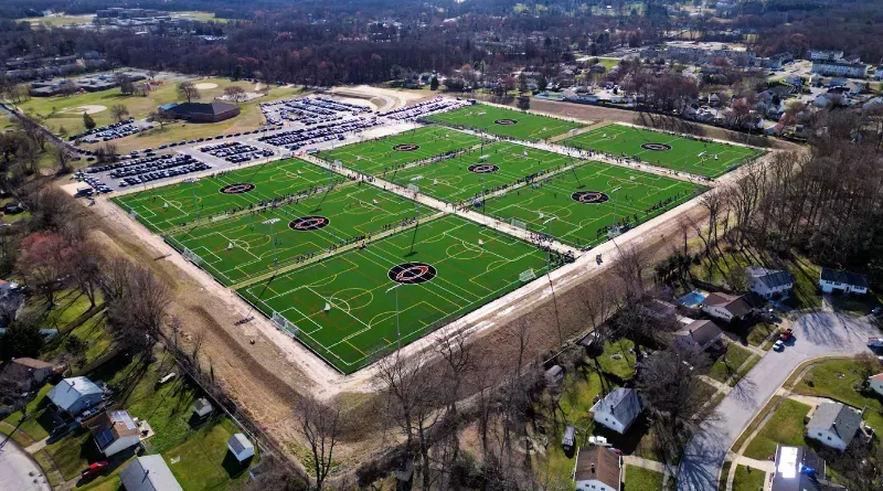 An aerial view of Coppermine Soccer Club's CopperPlex a large soccer field in a residential area.