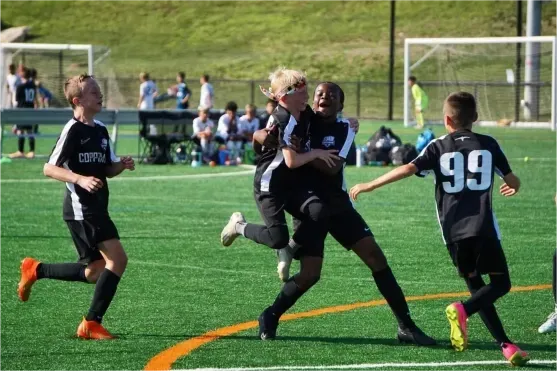 Coppermine Boy soccer players celebrating a win Coppermine Boy soccer players celebrating a win