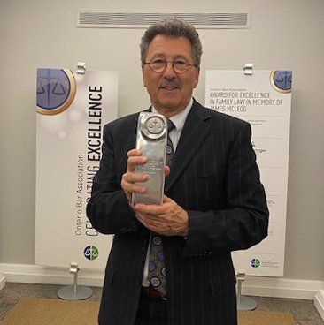 Gary Joseph winning award of excellence
