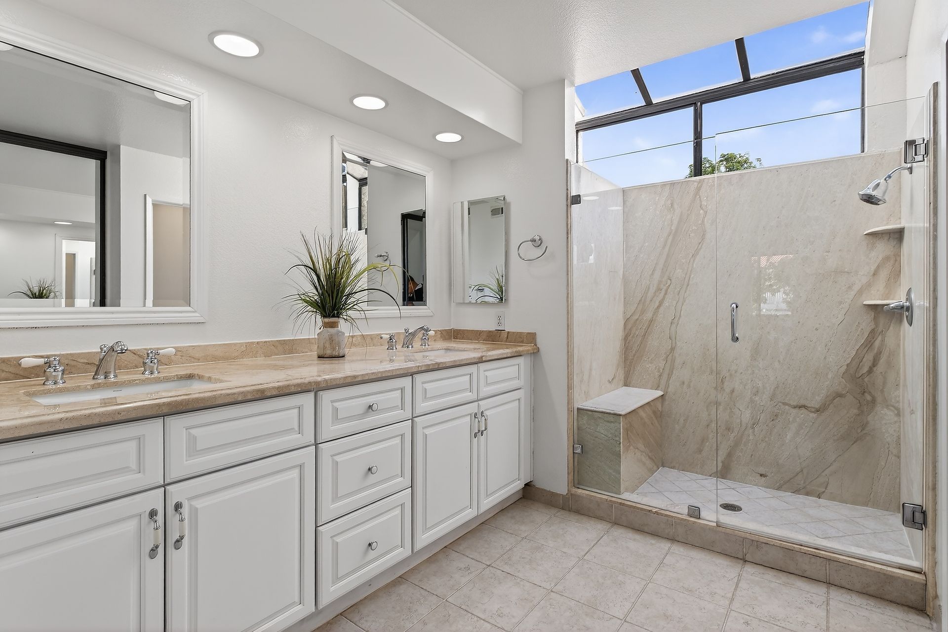 Master bathroom with skylight window above shower.