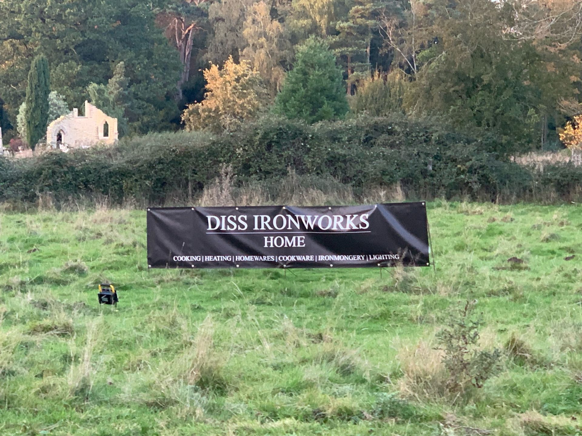 Black banner in a field: 