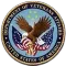 Department of Veterans Affairs seal with eagle, stars, and U.S. flag on a blue circular emblem