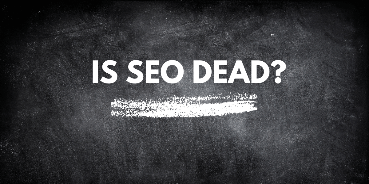 Chalkboard-style graphic with white text reading “IS SEO DEAD?” and a chalk underline.