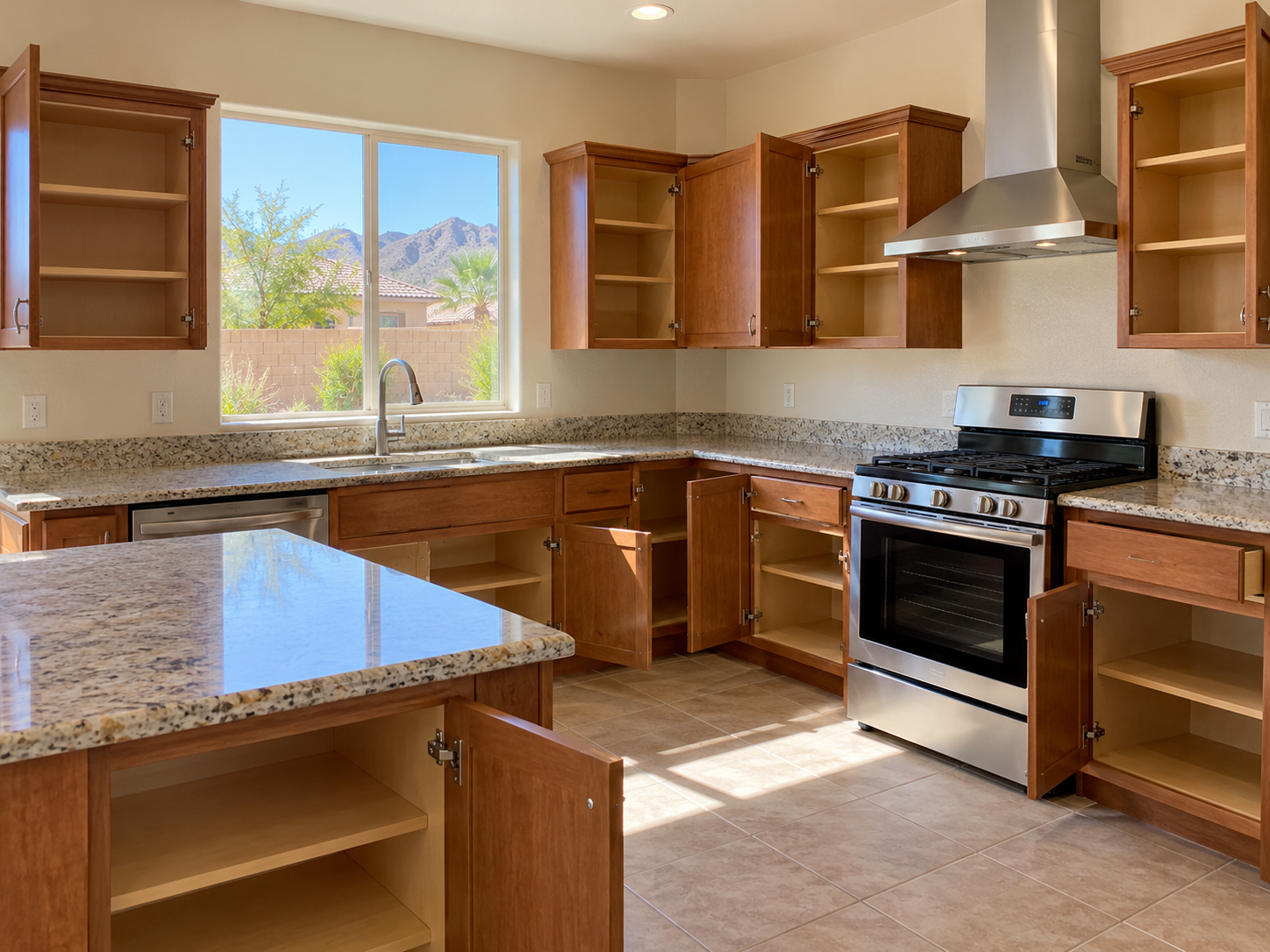 Henderson kitchen with open empty cabinets and cleaned oven after move-out service