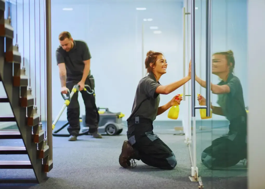 two person cleaning the hallway