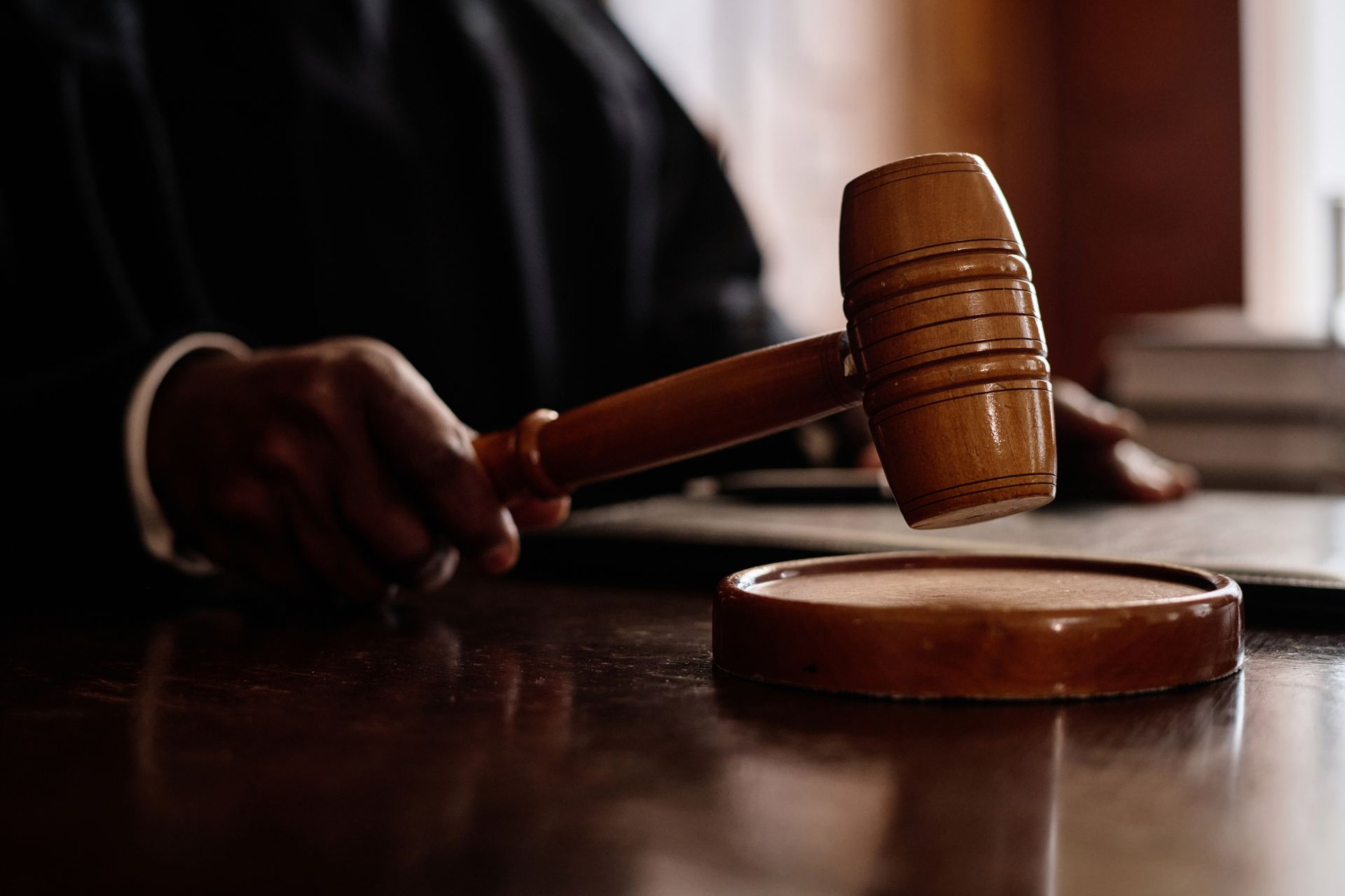 A judge holding a gavel.