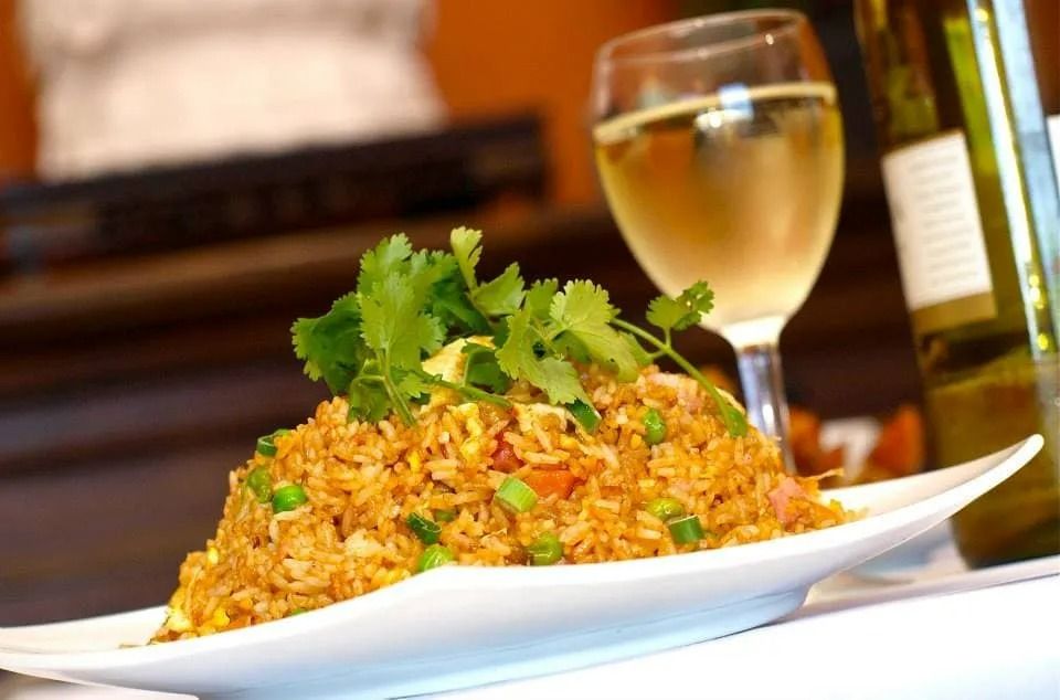 Fried Rice With Cilantro Garnish, on White Plate — L'il Buddha Asian Cuisine in Salamander Bay, NSW