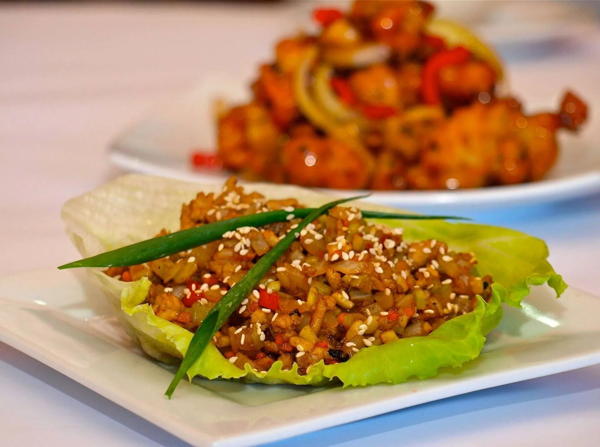 Fried Rice in Lettuce Cup, Sesame Seeds, With Fried Chicken — L'il Buddha Asian Cuisine in Salamander Bay, NSW