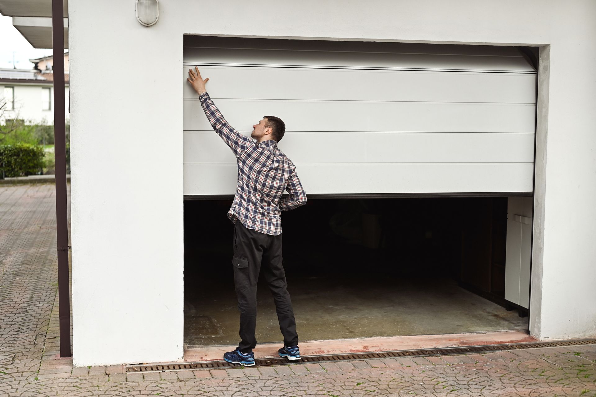 A couple of loading doors on the side of a building.