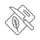 A grey line icon of a knife resting on a cutting board next to a leafy vegetable.