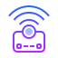 A purple and blue icon of a camera with waves coming out of it.