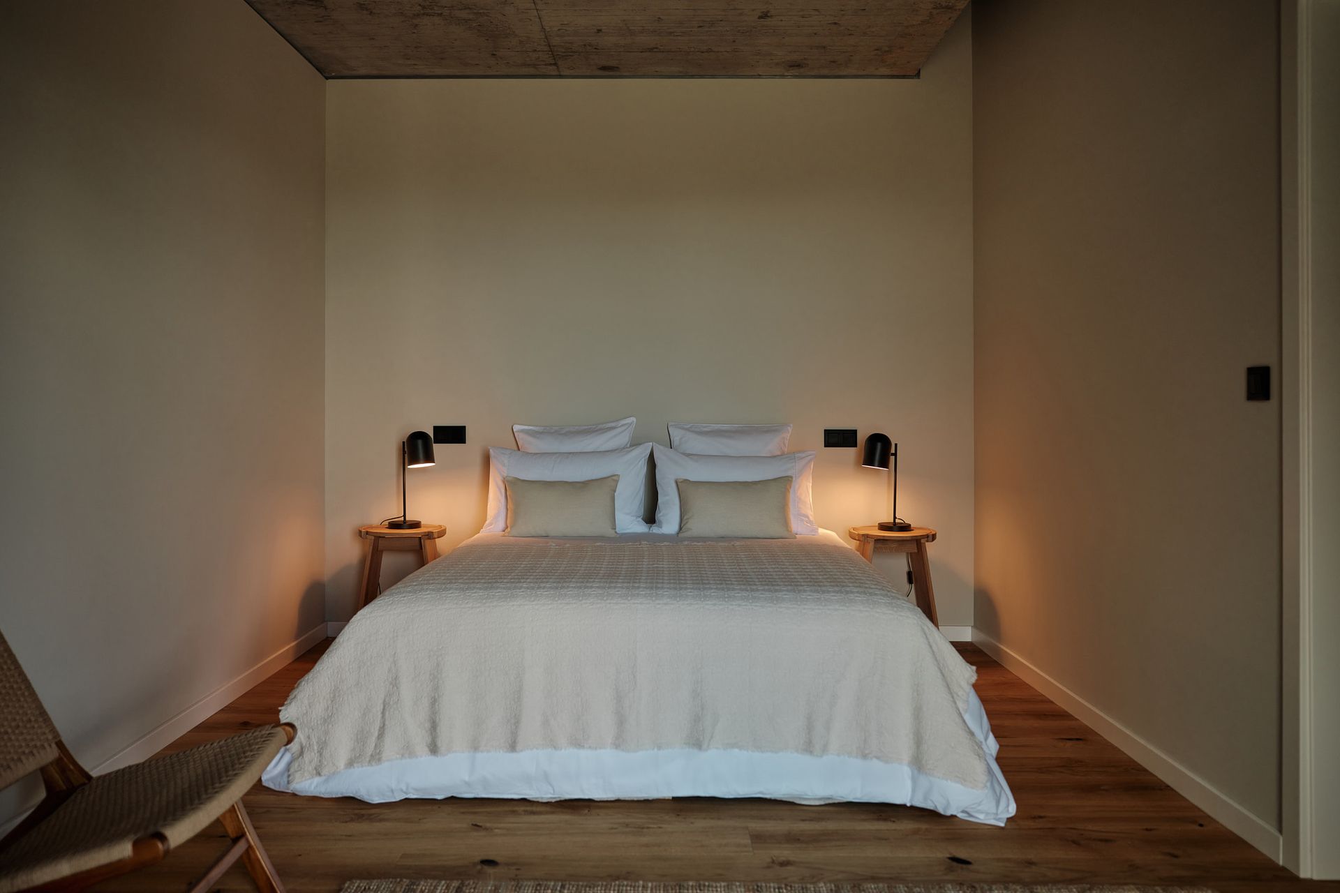 There is a large bed in the middle of the room.