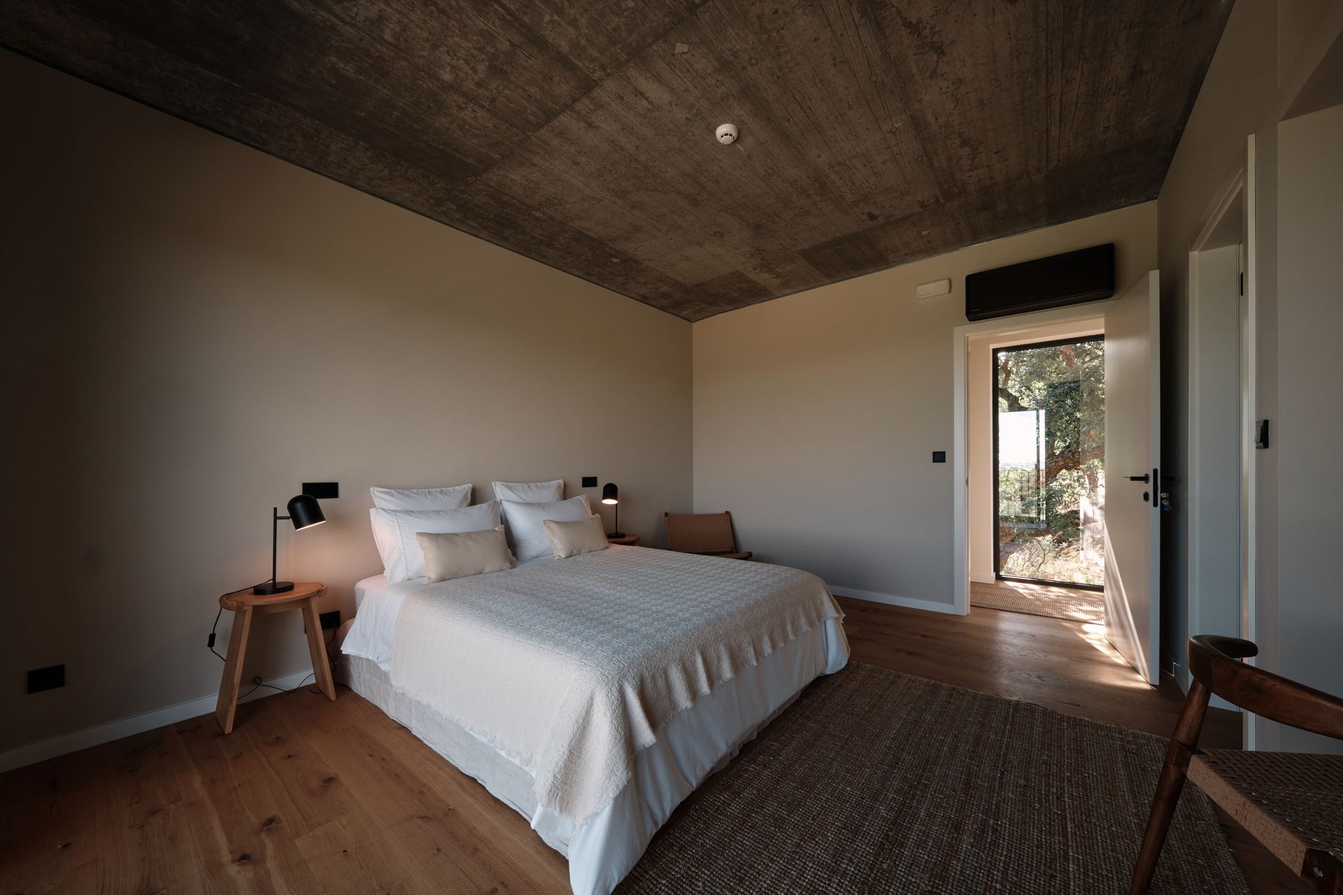 There is a large bed in the middle of the room.