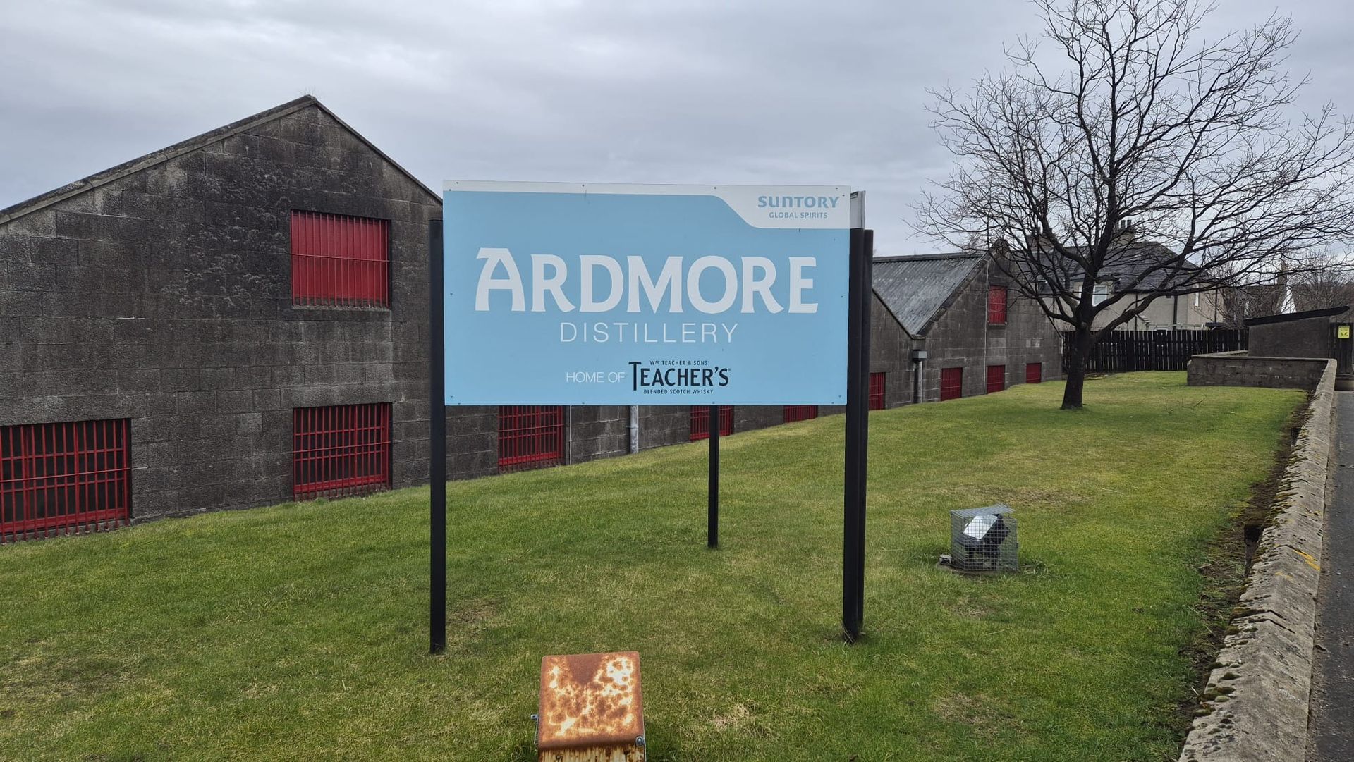 Blue sign with the Ardmore Distillery name on it