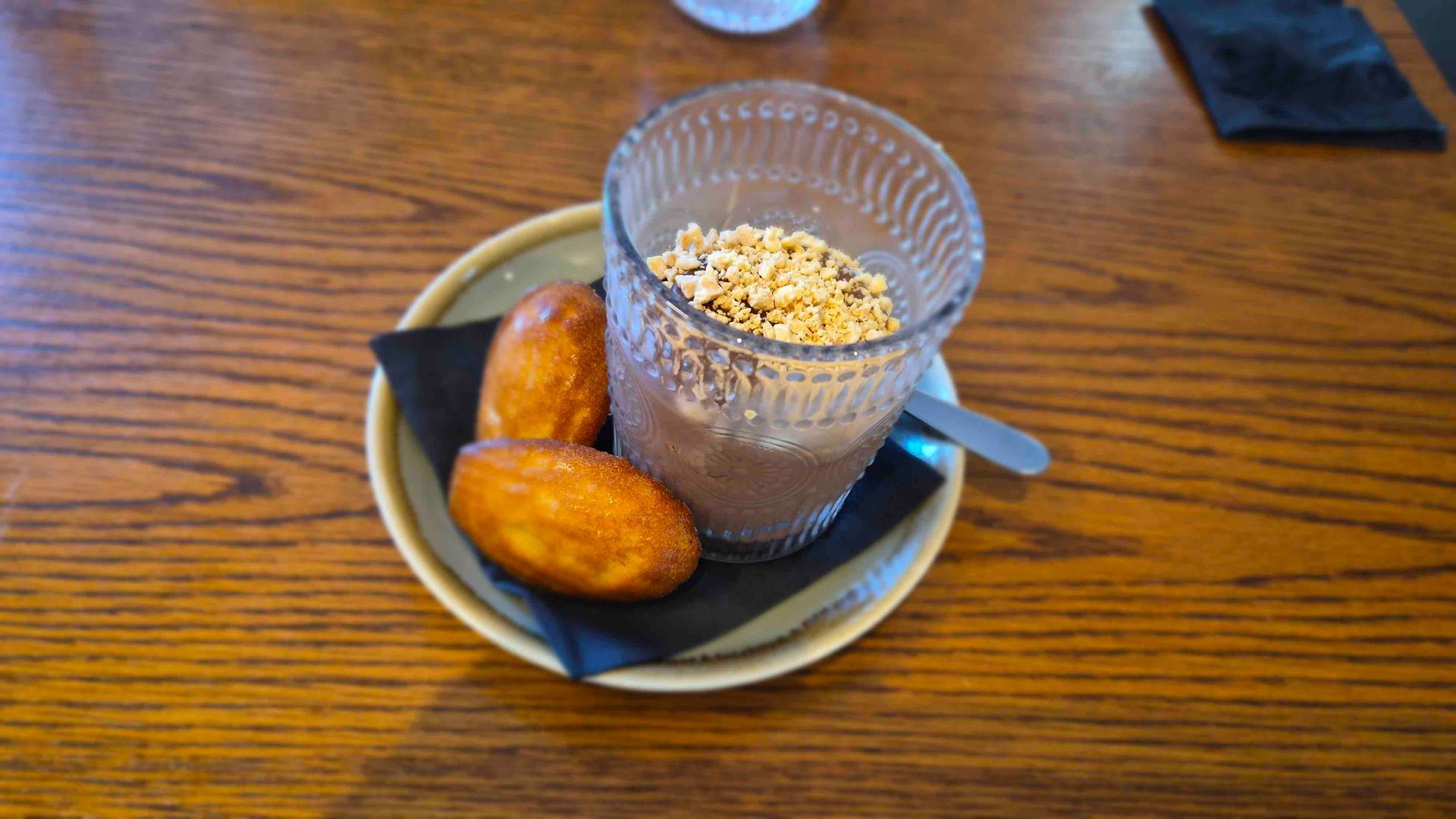 Chocolate Mousse with a Chocolate Crumb, Caramel Sauce and Orange Madeleines
