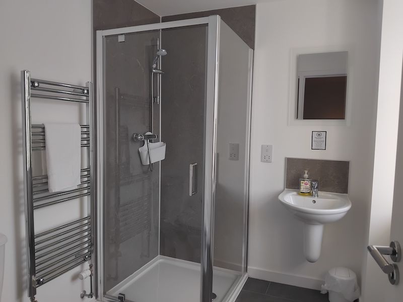 Clean modern guest room en-suite shower room at The Station Hotel, Insch, Aberdeenshire, Scotland