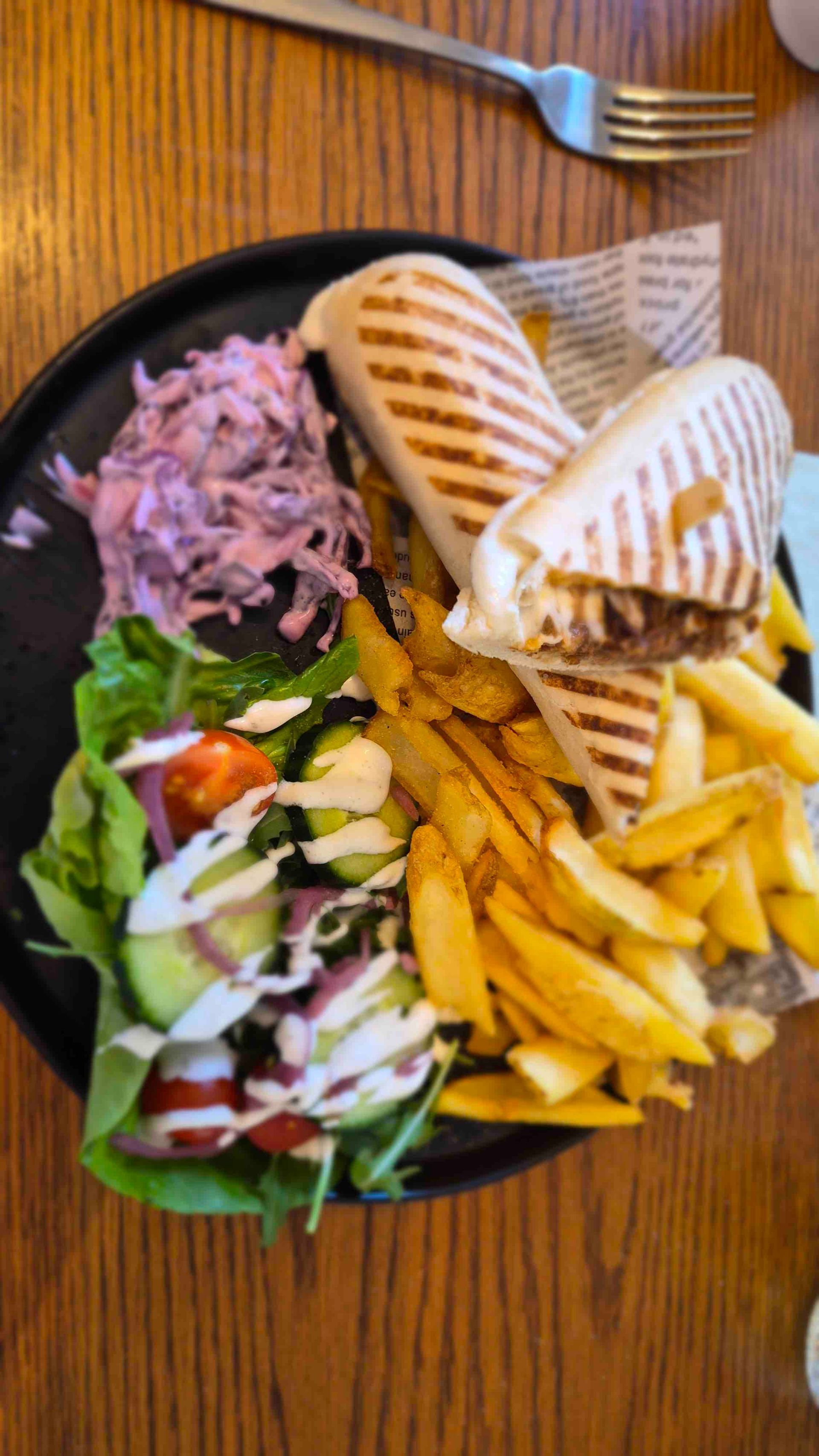 Pulled Beef Panini with rustic fries, homemade slaw and salad