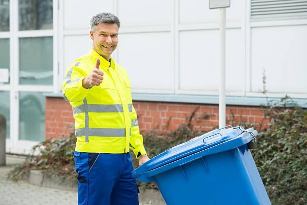 Walker Trash Solutions team providing doorstep trash pickup