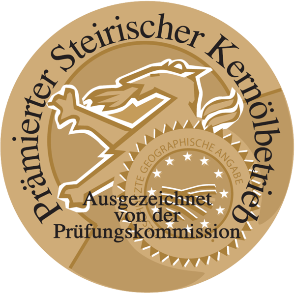 Gold Gault&Millau badge with “Steirischer Kernölbetrieb” and “Prämierter” text