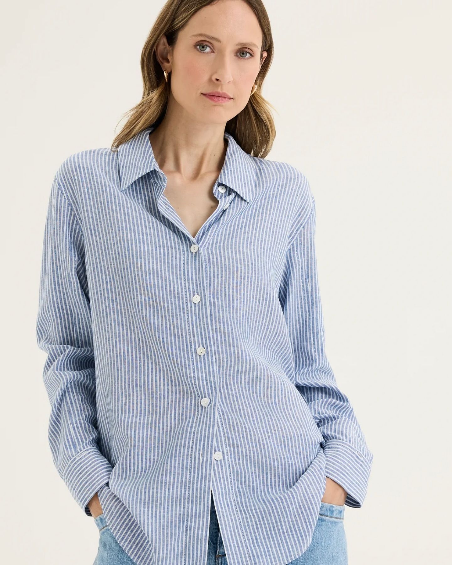 A Person Wearing a Blue and White Pinstriped Button-down Shirt — Kitchen Bar and More In Caloundra, QLD