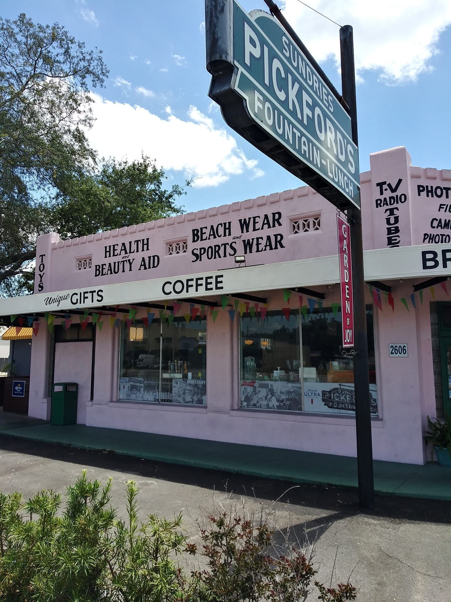 A pink building with a sign that says pickford on it