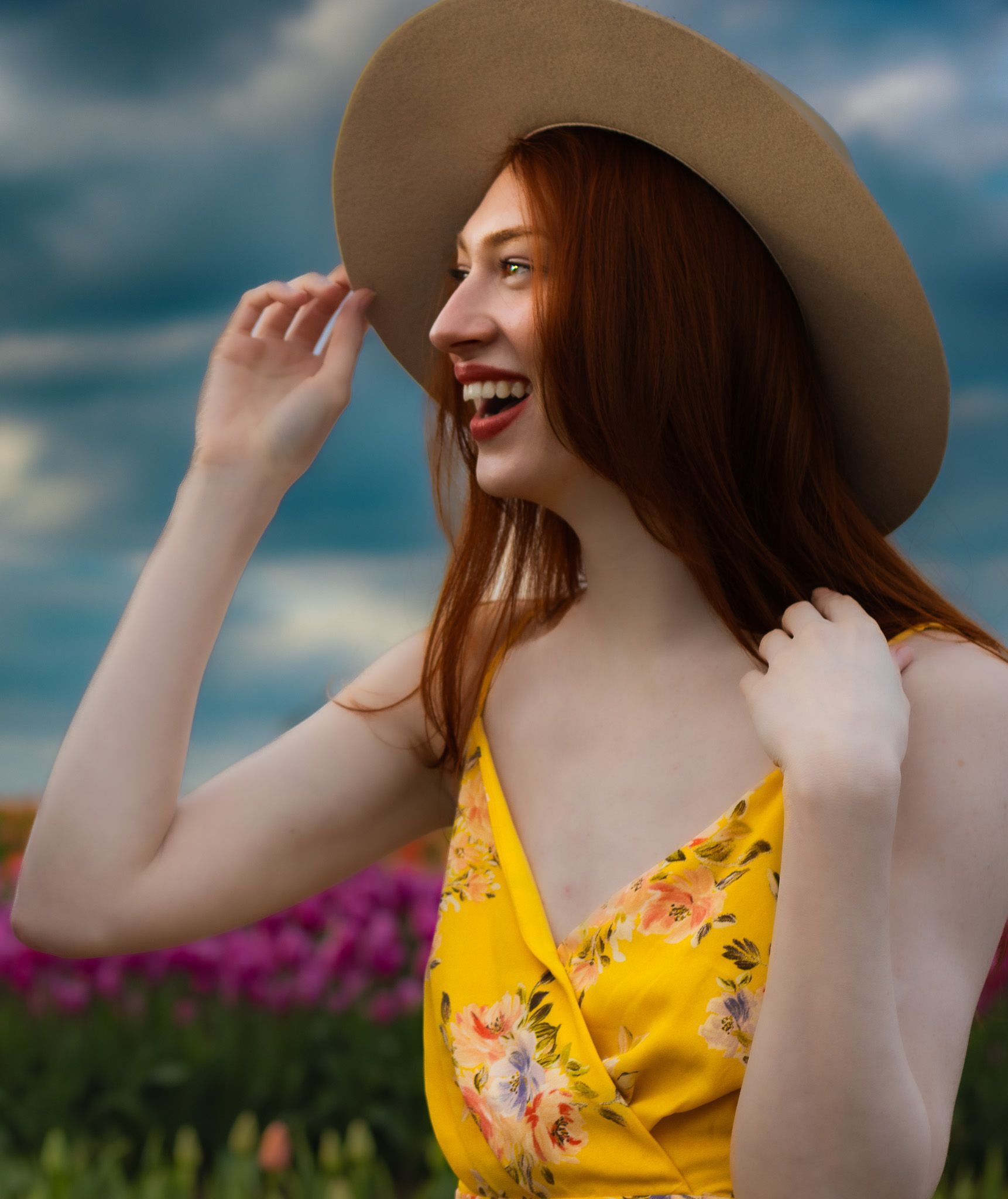 Model posing for editorial photography at woodenshoe Tulip Festival Oregon natural landscape
