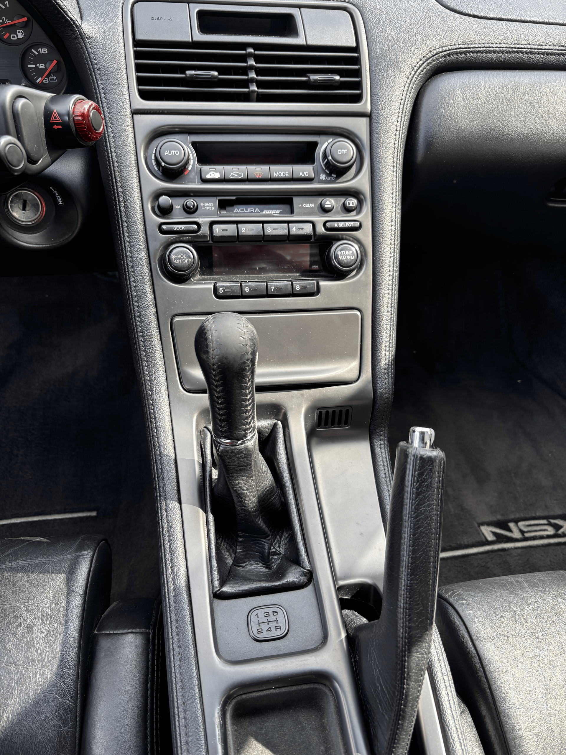 The interior of a honda nsx sports car