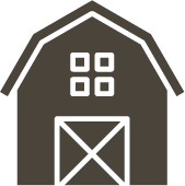 An icon of a barn with squares on the windows.