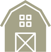 An icon of a barn on a white background.