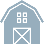 An icon of a barn with squares on the windows.