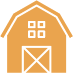 An icon of a barn with square windows and a door.
