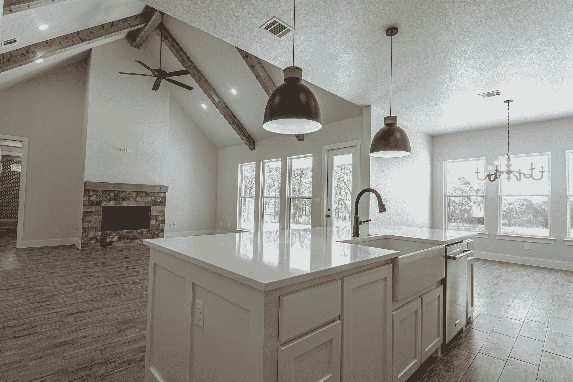 There is a large island in the middle of the kitchen.