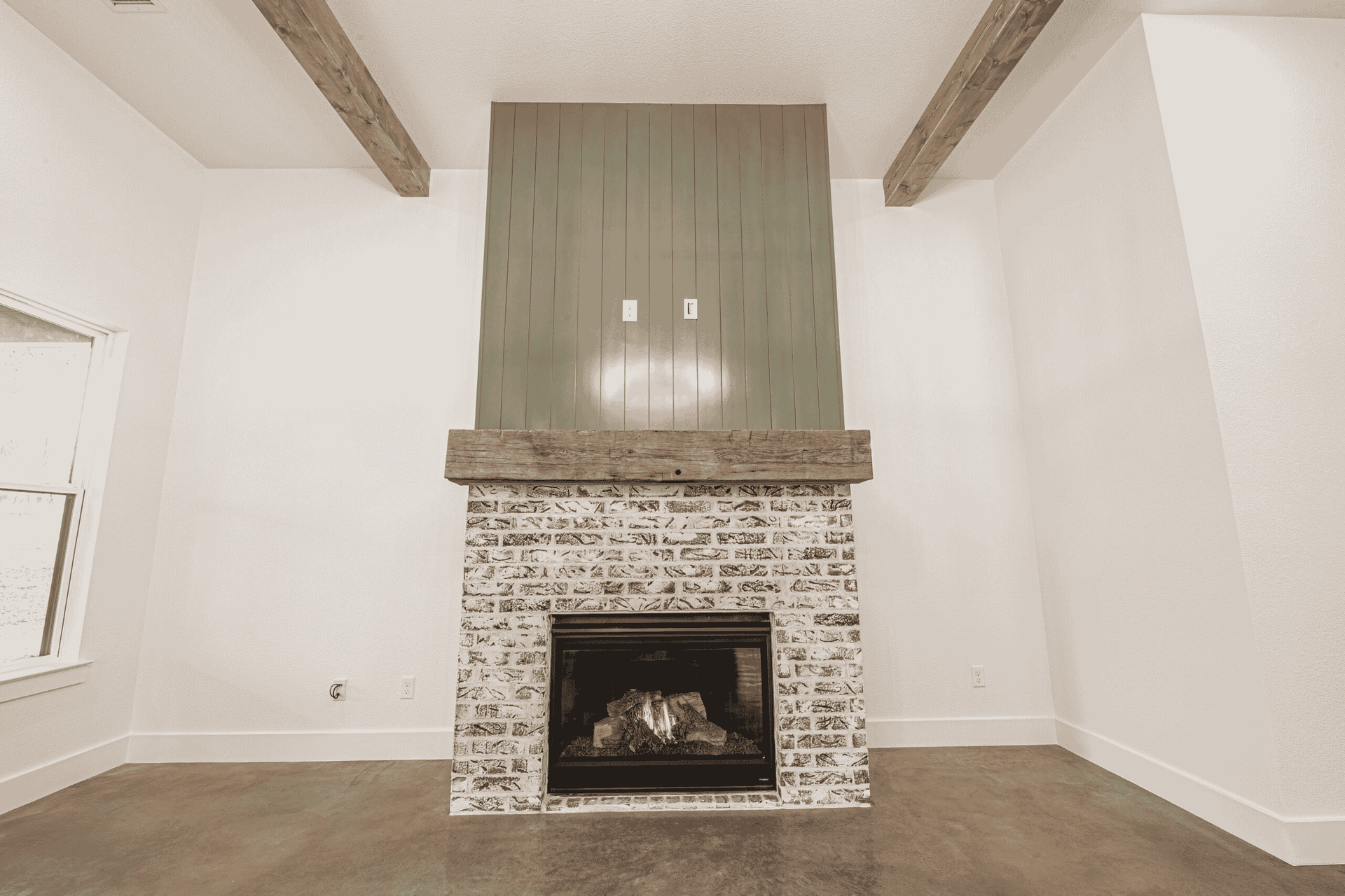 There is a fireplace in the middle of the room.