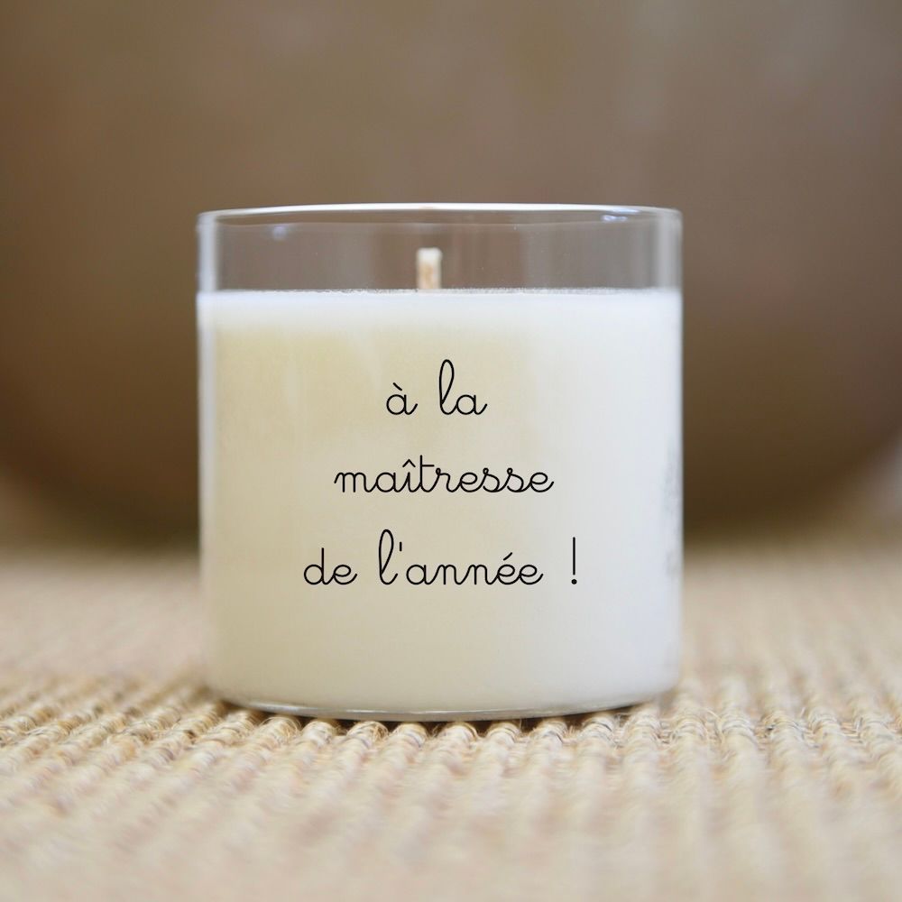 Candle in clear glass with text 