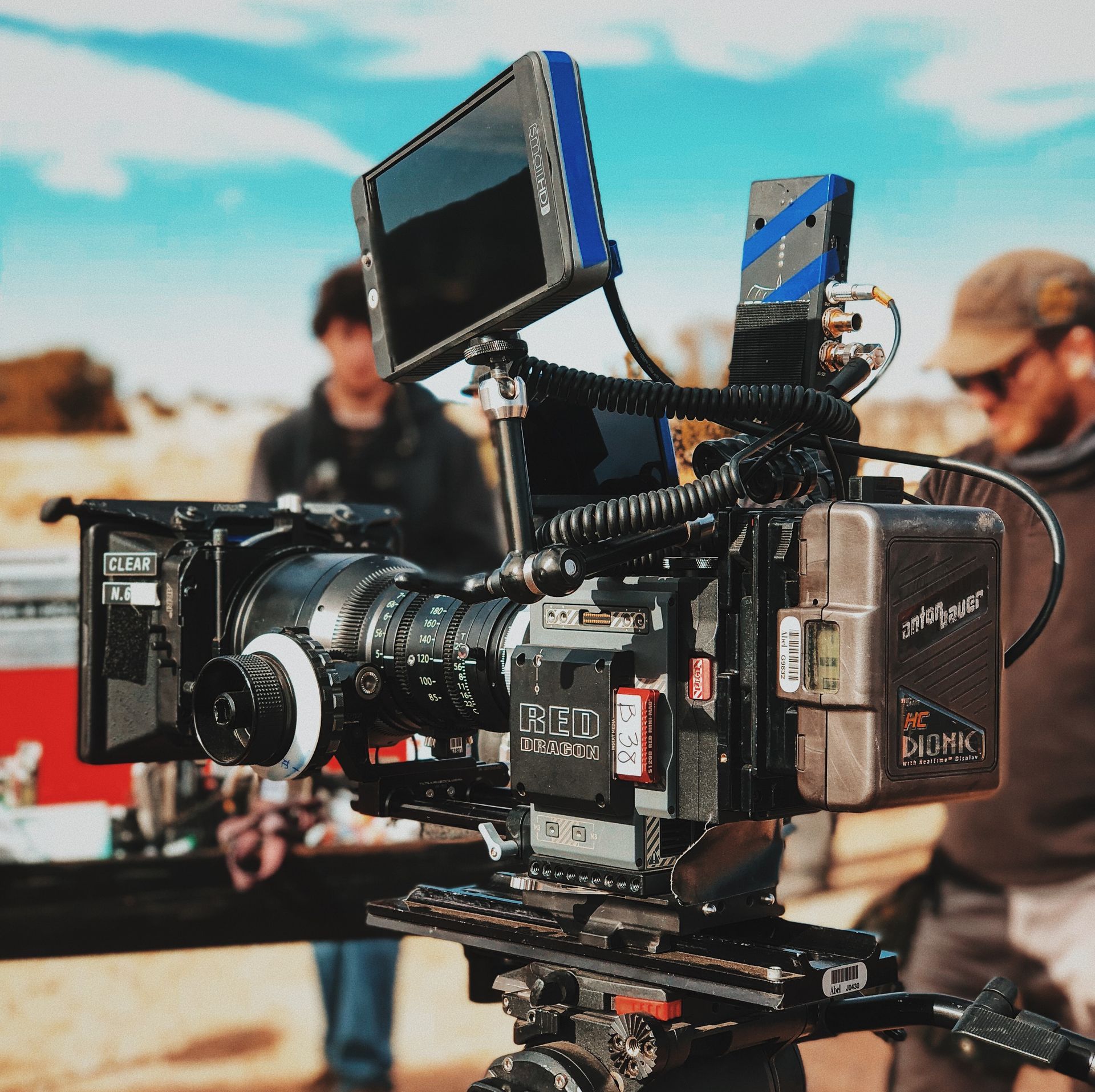 RED cinema camera on location A camera that has the word trust on it