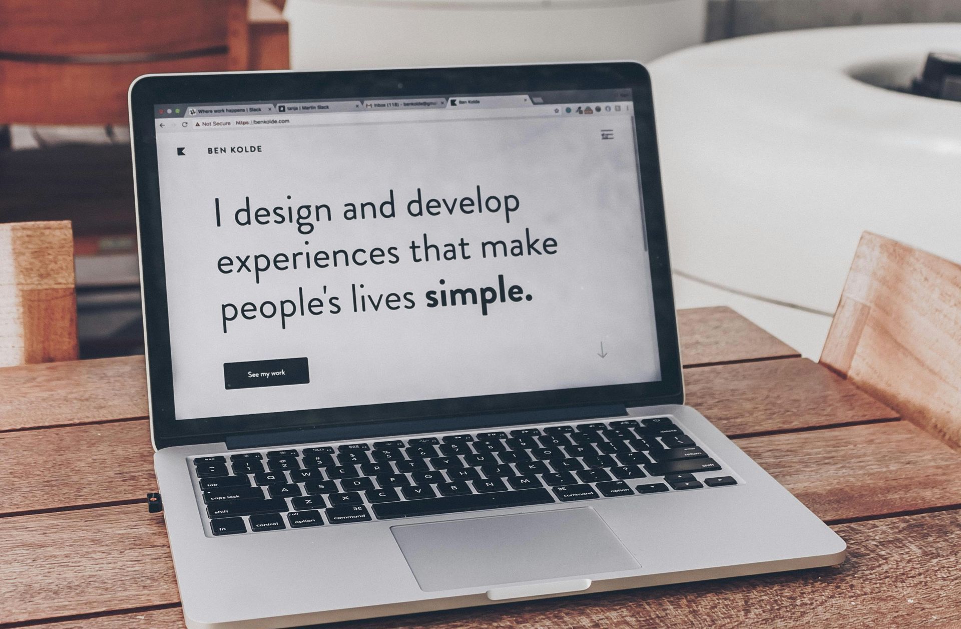 A laptop that says Laptop displaying website text: