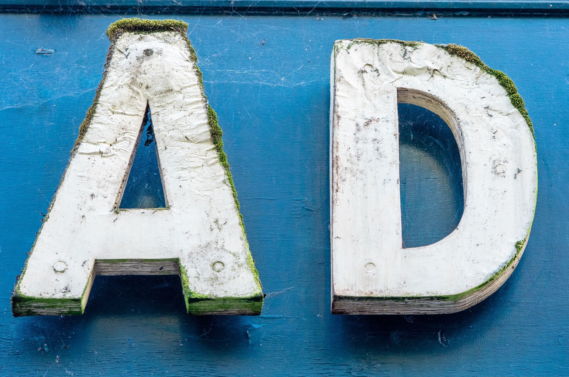White, weathered letters 
