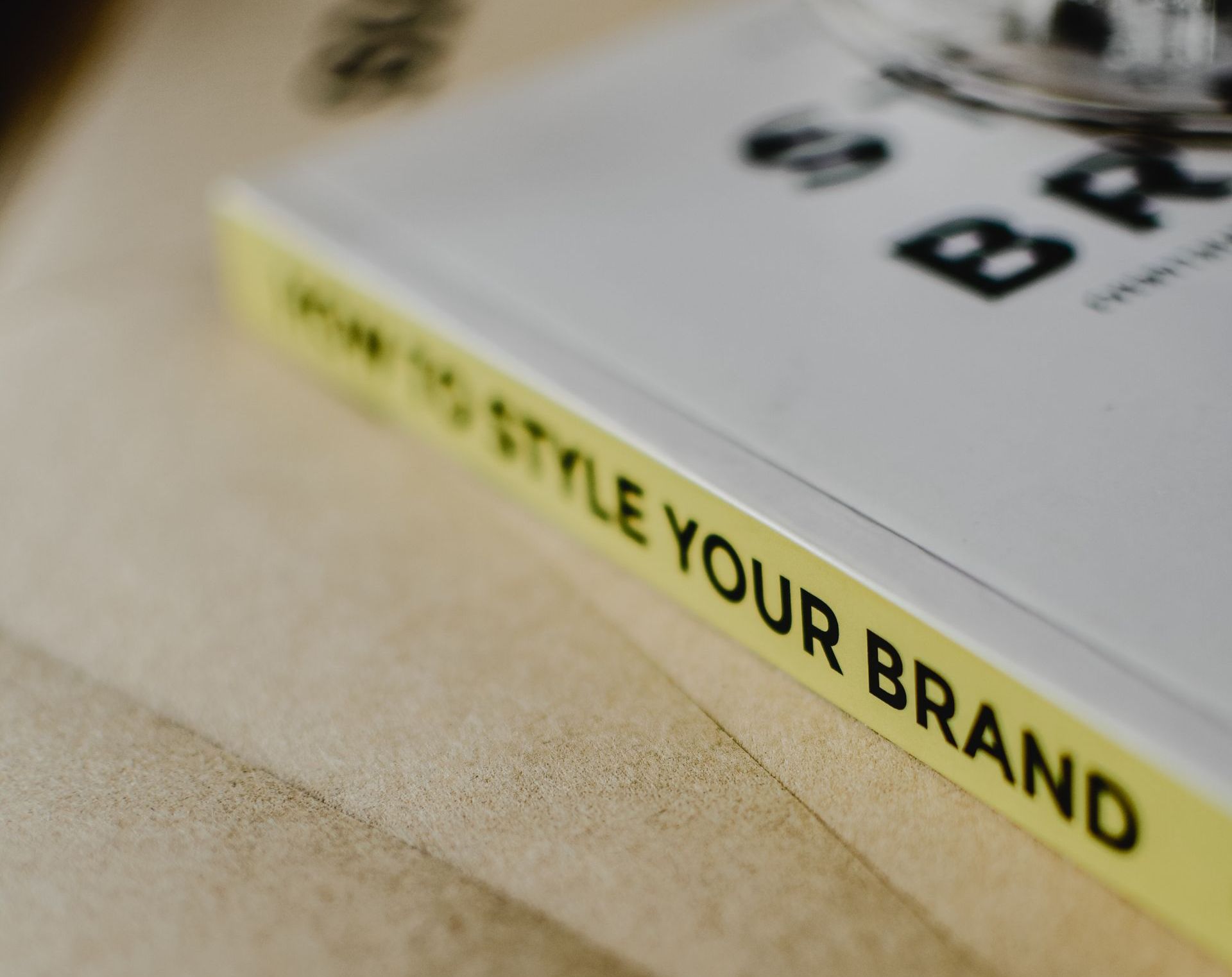 A book is titled how to style your brand