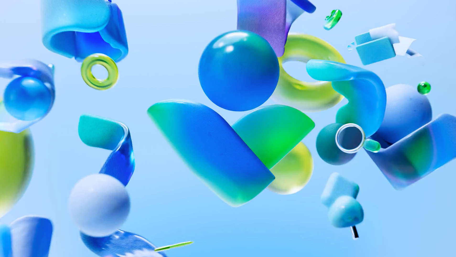 Abstract arrangement of blue, green, and white 3D shapes floating against a light blue background.