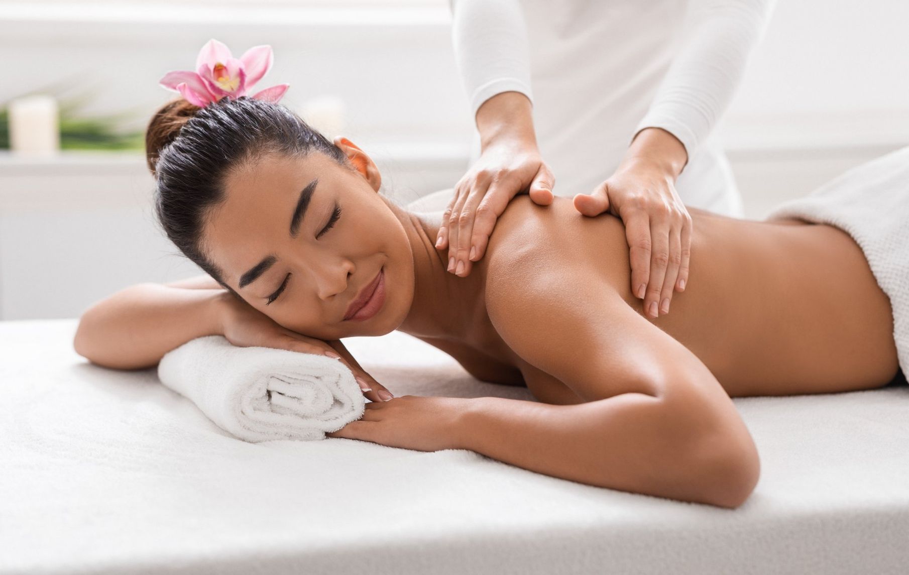 Woman receiving Thai Wellness