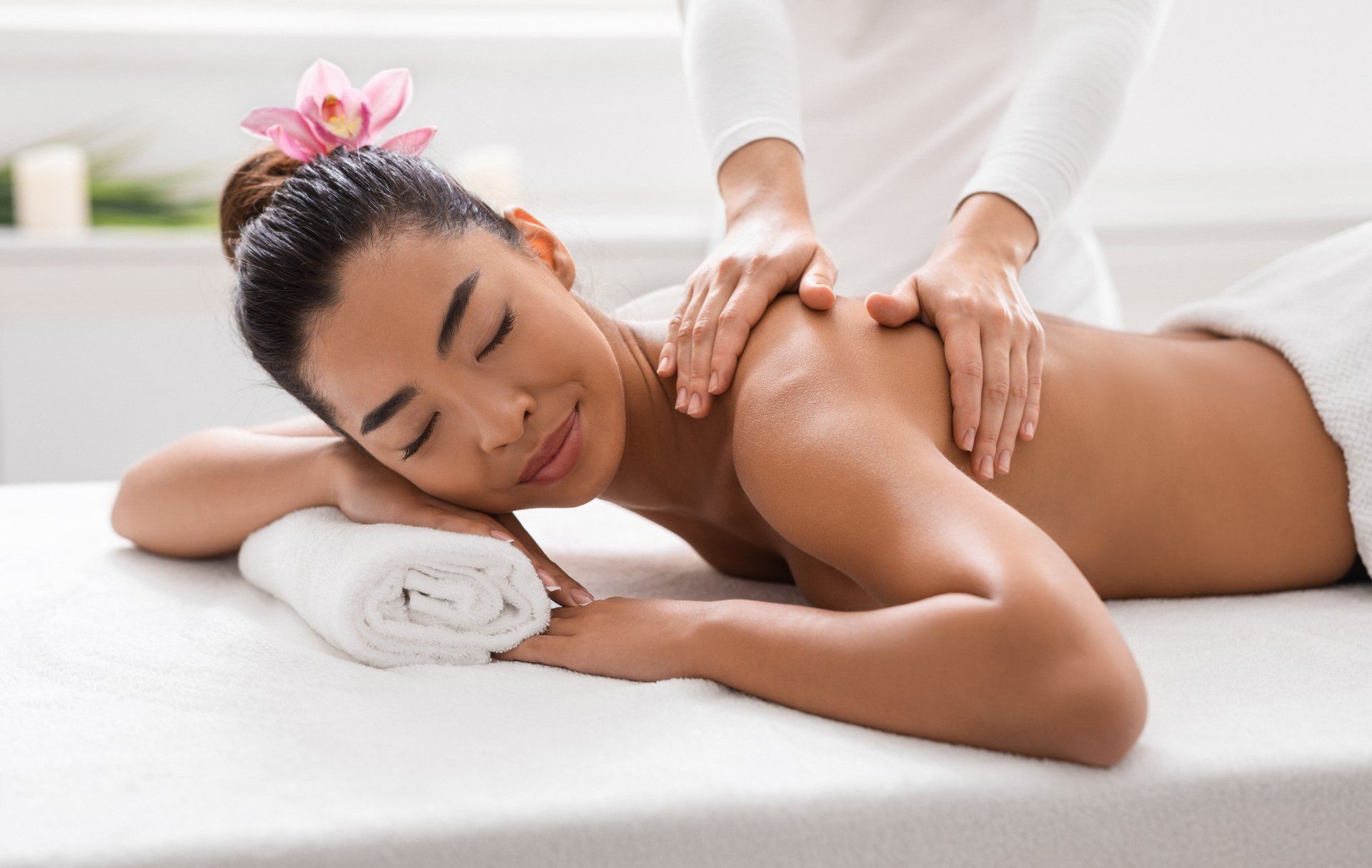 Woman receiving Thai Wellness