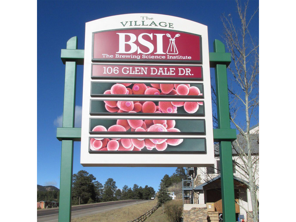 Free standing illuminated sign with multiple panels