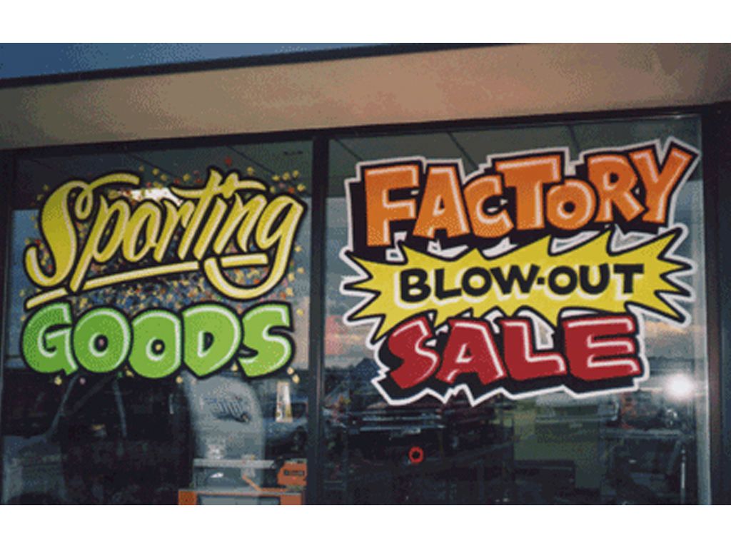 Fluorescent hand lettering on windows
