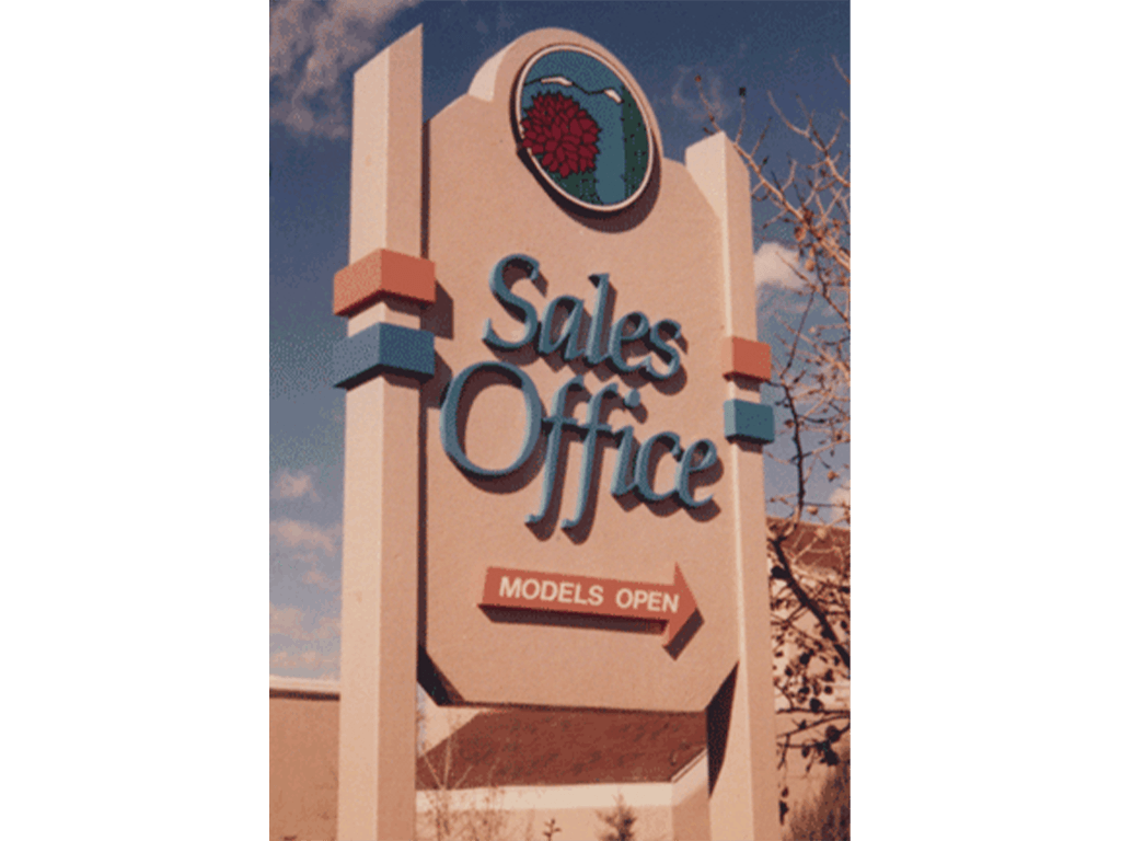 Stucco sign with cut out graphics