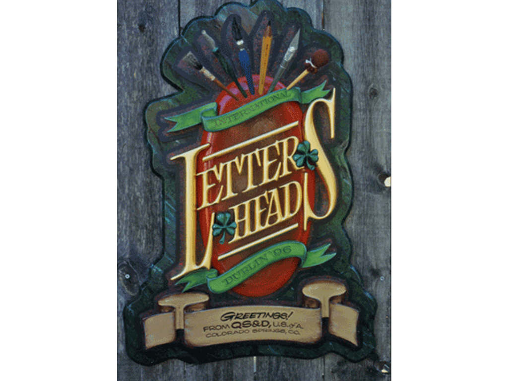 Hand carved, gold leaf sign