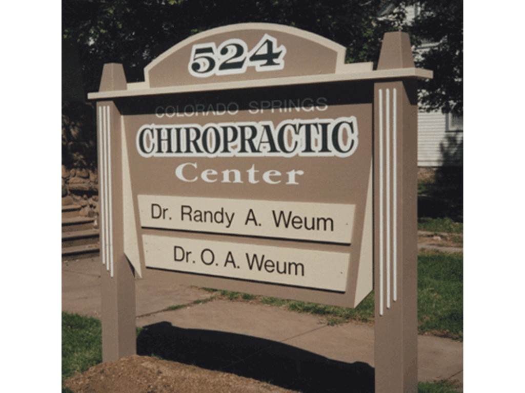 Uniquely shaped, free standing sign