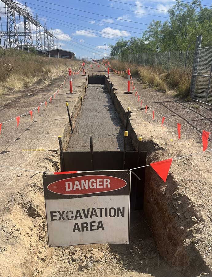 A Sign That Says Danger Excavation Area on It — Country Powerline Constructions in Young, NSW
